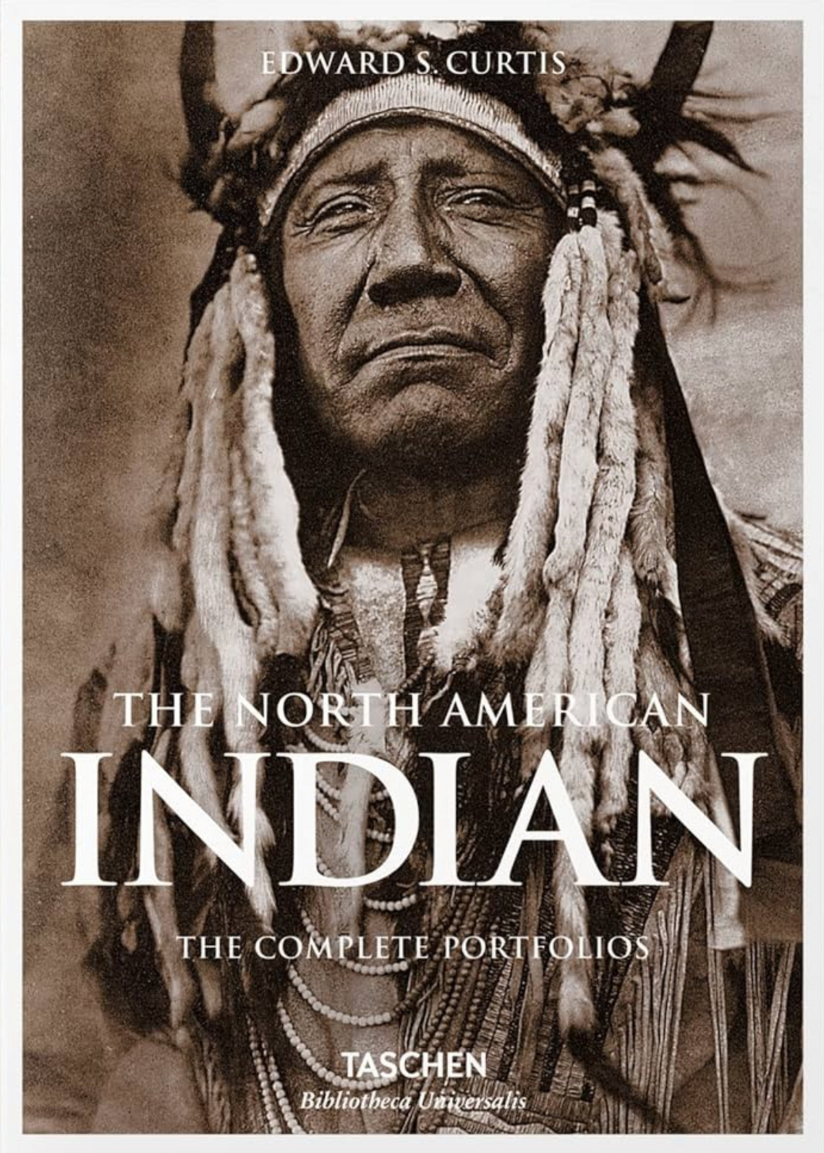 Book cover of The North American Indian: The Complete Portfolios by Edward S. Curtis (Author, Photographer), Hans Christian Adams (Introduction), Theodore Roosevelt (Foreword), Rolf Fricke (Trans.)