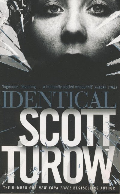 Book cover of The Burden Of Proof by Scott Turow