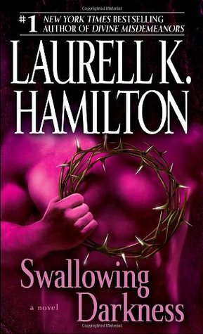 Book cover of Swallowing Darkness by Laurell K. Hamilton