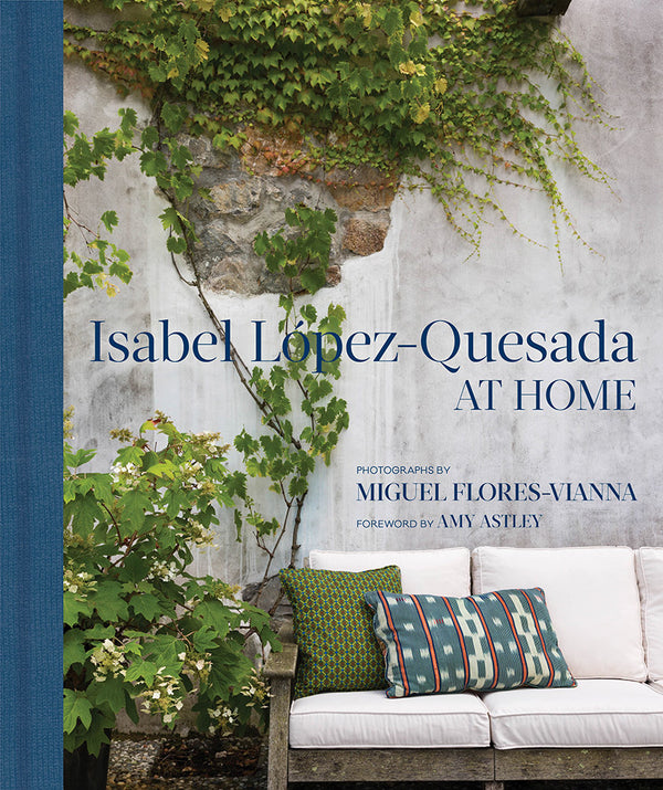 Book cover of At Home: Isabel LÃ³pez-Quesada: Combining Period And Contemporary Furniture And Art, The Homes Of Isabel LÃ³pez-Quesada Are Unforgettable by Isabel Lopez-Quesada, Amy Astley (Foreword), Miguel Flores-Vianna (Photographer)