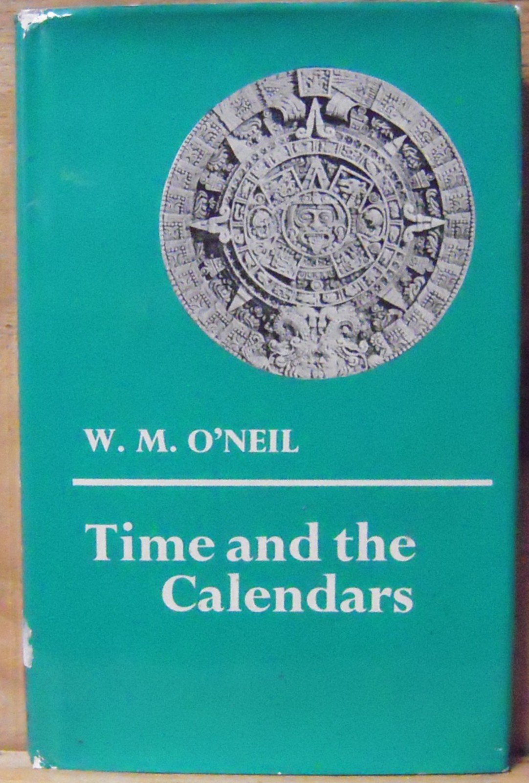 Book cover of Time and the Calendars by W.M. O'Neil