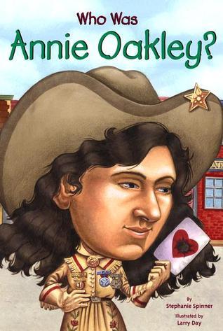 Book cover of Who Was Annie Oakley? by Stephanie Spinner, Who H.Q., Larry Day (Illus.)