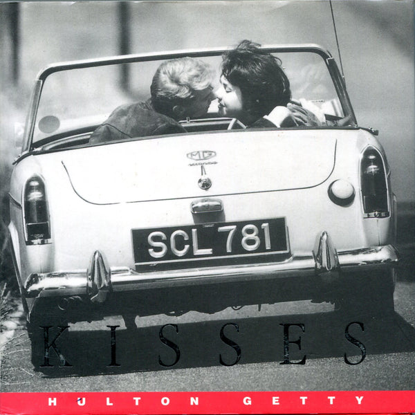Book cover of Kisses: A Photographic Celebration by Suzi Green (Text and picture research)