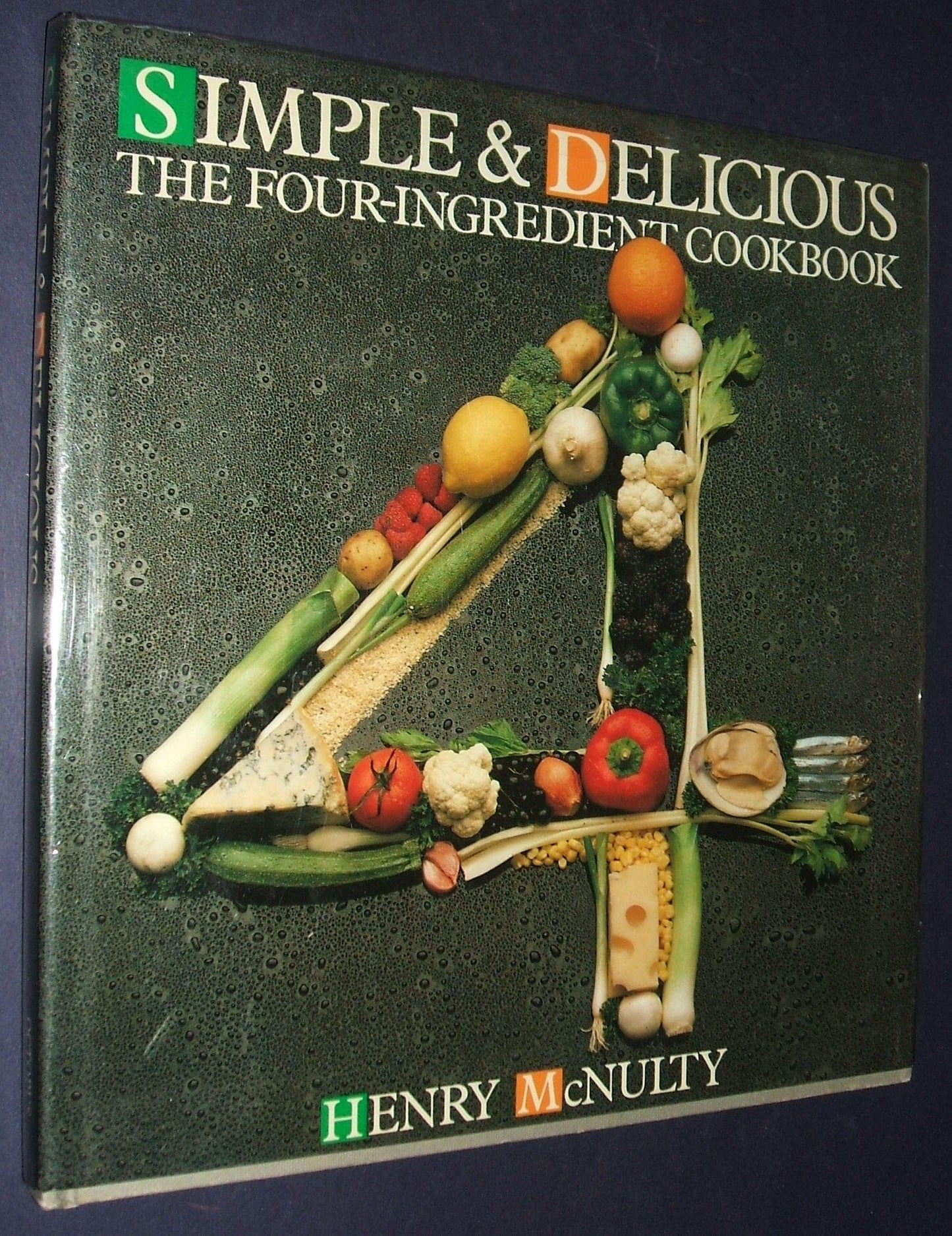 Book cover of Simple And Delicious The Four Ingredient C by Henry McNulty