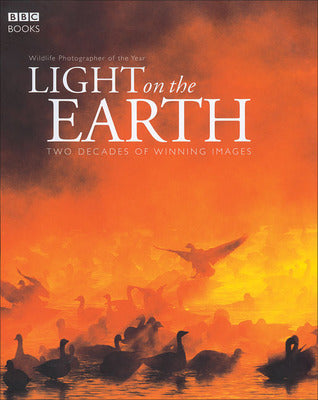 Book cover of Light On The Earth: Two Decades Of Winning Images by David Attenborough (Foreword)