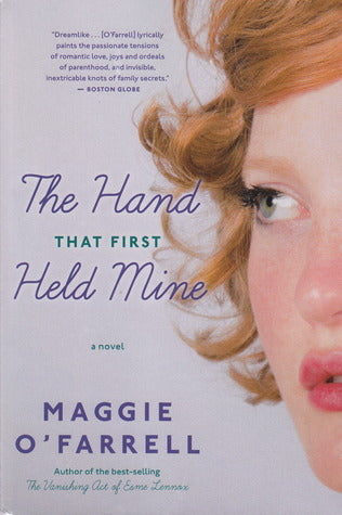 Book cover of The Hand That First Held Mine by Maggie O'Farrell