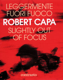 Book cover of Slightly Out of Focus: The Legendary Photojournalist's Illustrated Memoir of World War II by Robert Capa, Cornell Capa (Foreword), Richard Whelan (Introduction)